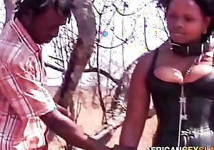 Maturity for an alfresco african slut instigation tied up to a tree