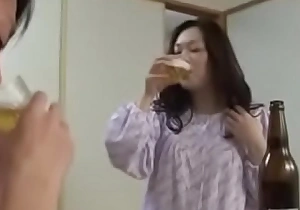 Japanese milf withyoung boy hit the sauce and fuck