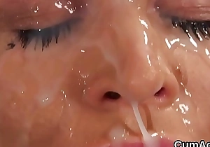 Sexy babe gets cumshot on her face sucking all the love juice