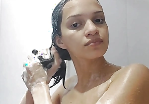 Chap-fallen girl taking a bath