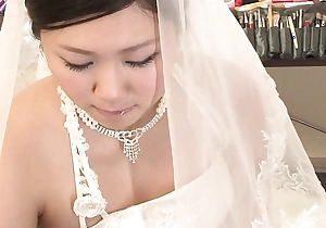 Brunette Emi Koizumi fucked superior to before wedding dress uncensored.