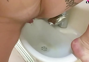 Classy piddles in a public sink